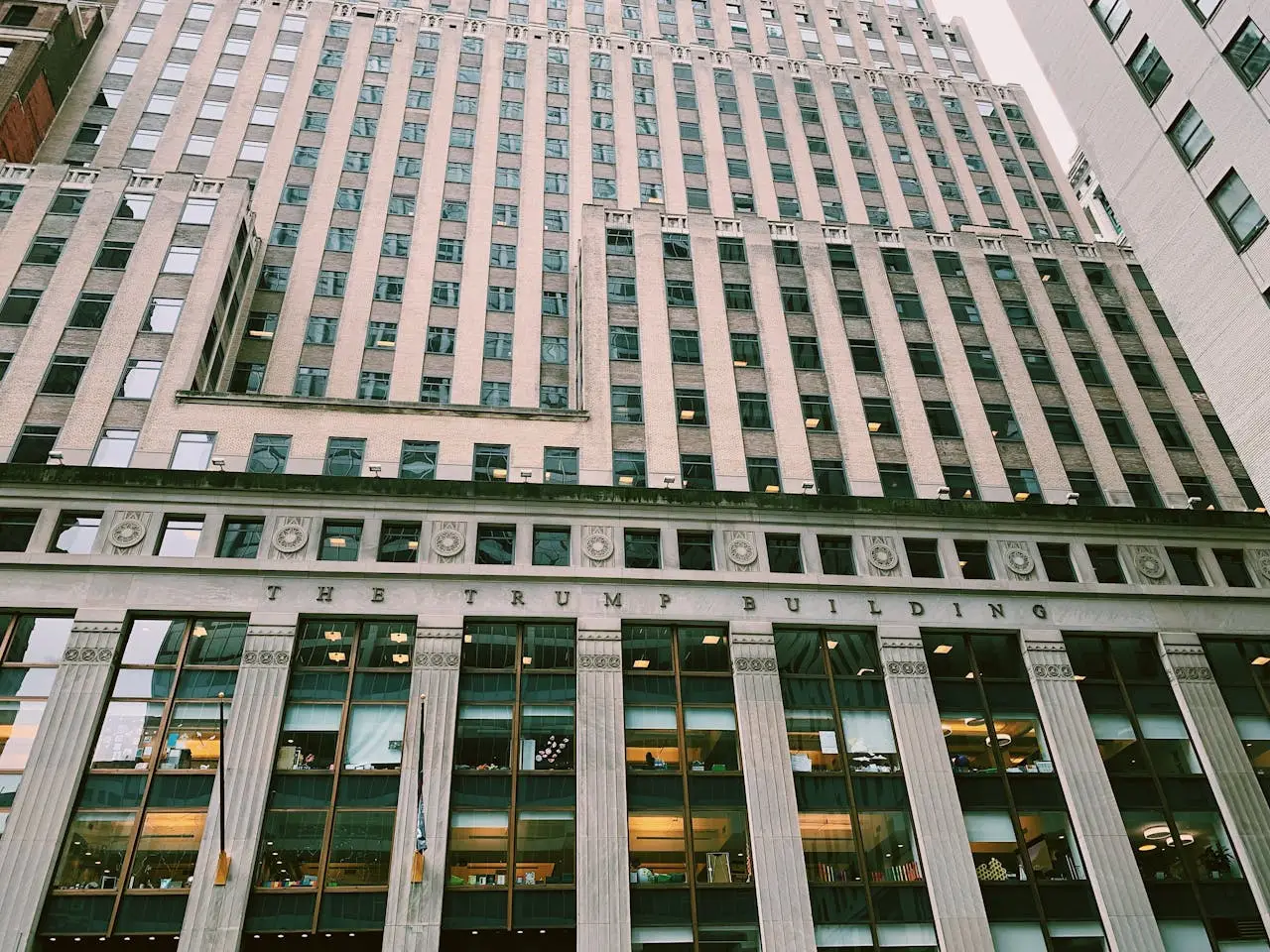 Facade of The Trump Building in downtown New York City, showcasing Art Deco architecture.